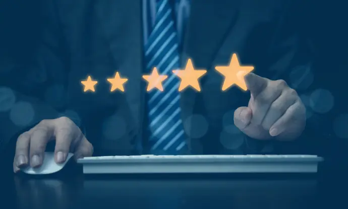 eutronix mission operational excellence with businessman rating service using digital stars on tablet