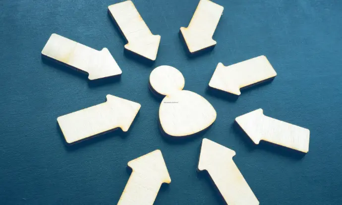 eutronix mission customer focus visual with person icon at center and arrows pointing inward to highlight client-centric approach